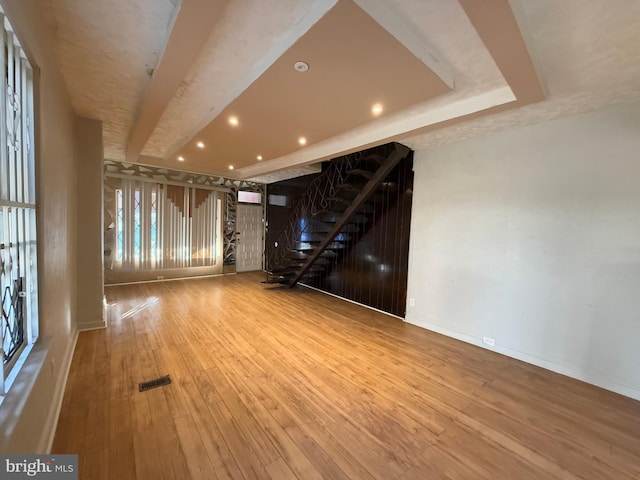 empty room featuring hardwood / wood-style flooring