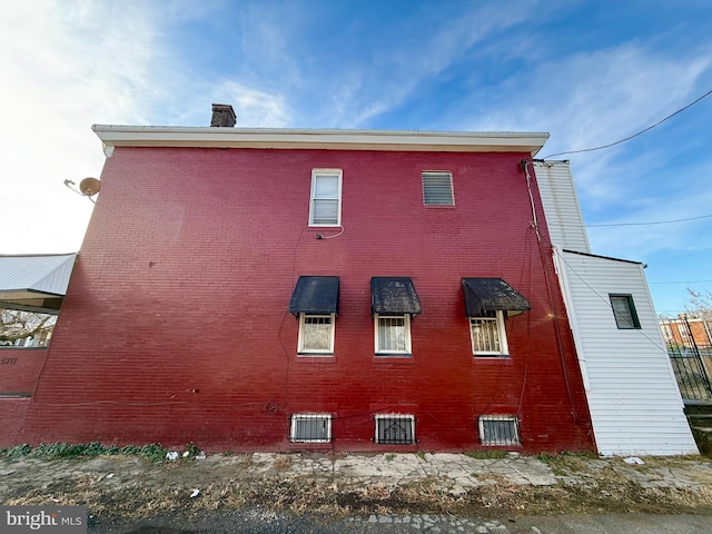 view of property exterior with cooling unit