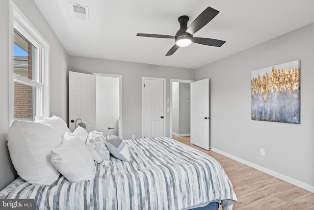 bedroom featuring ceiling fan and light wood-type flooring