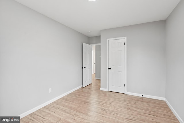 unfurnished bedroom with light hardwood / wood-style floors