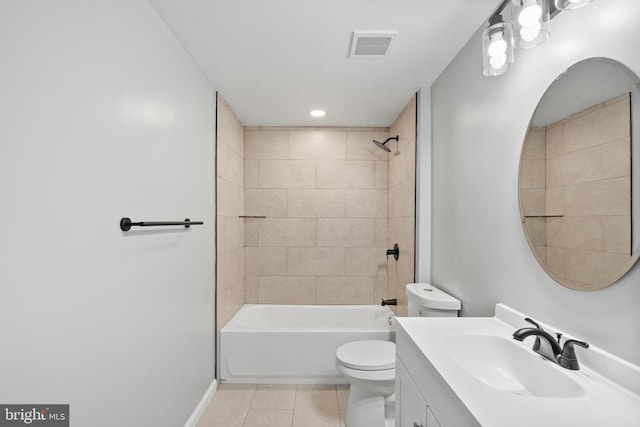 full bathroom featuring toilet, vanity, tile patterned floors, and tiled shower / bath