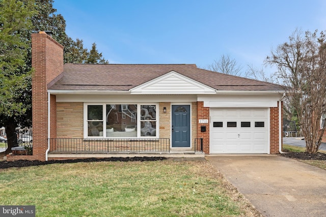 ranch-style home with a front yard and a garage