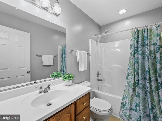 full bathroom featuring vanity, toilet, and shower / bath combo with shower curtain