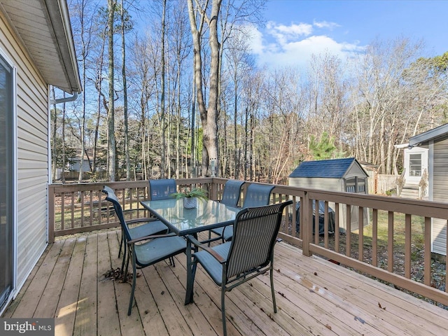 wooden deck with a storage unit