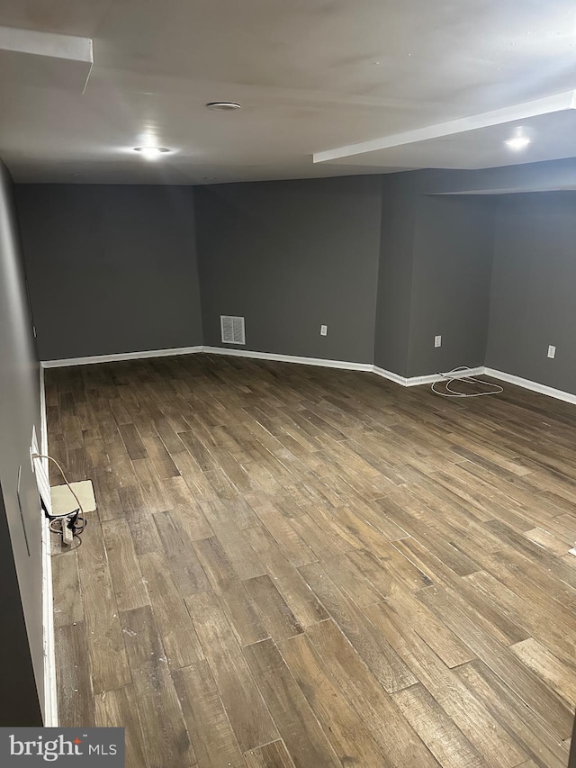 empty room featuring wood-type flooring