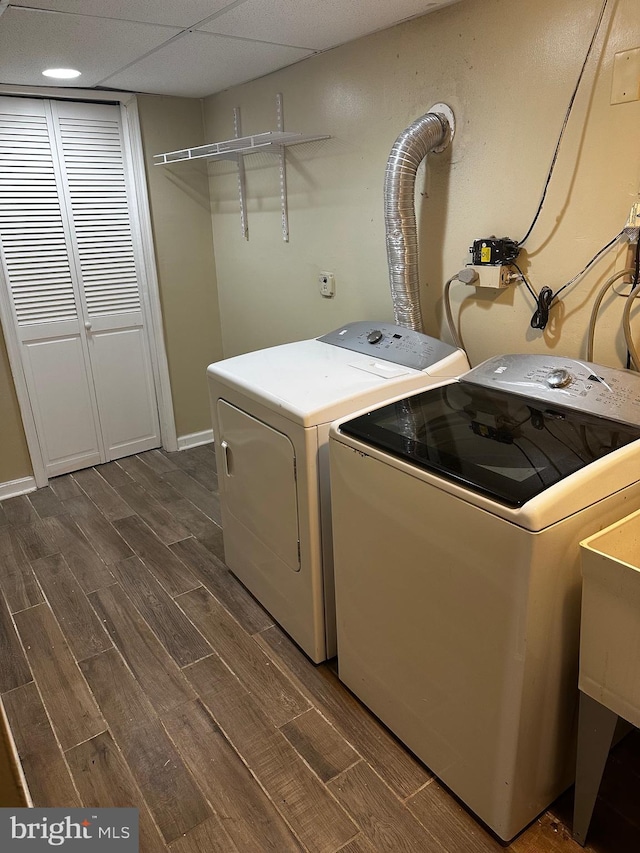 washroom featuring washer and dryer