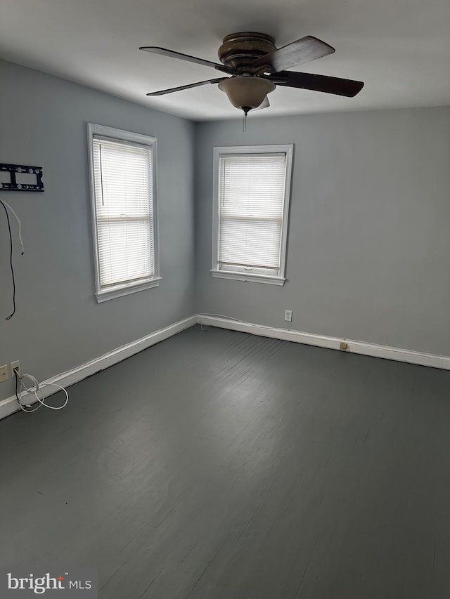 unfurnished room featuring ceiling fan and wood-type flooring