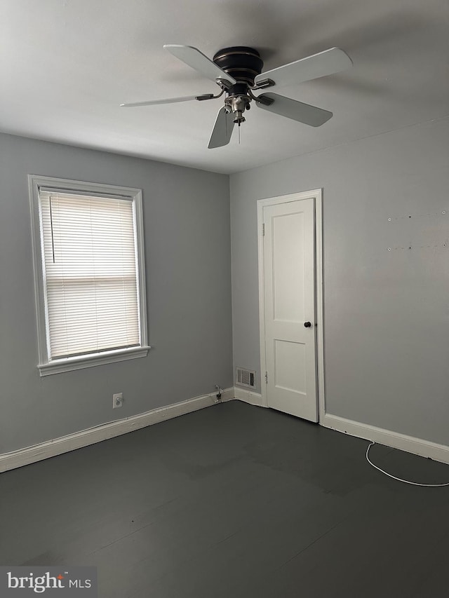 unfurnished room featuring ceiling fan