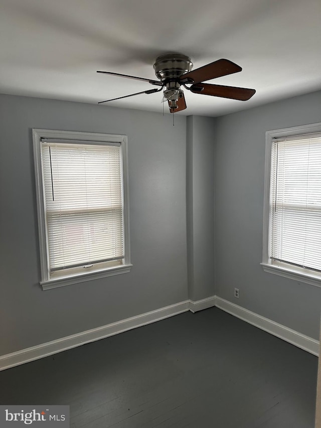 unfurnished room with ceiling fan