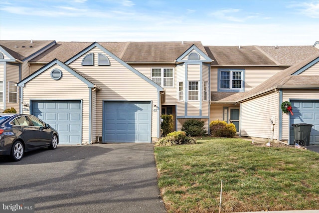 view of property featuring a front yard