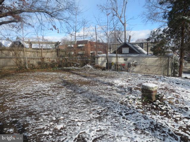 view of yard covered in snow