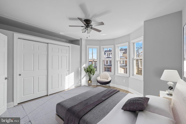 bedroom featuring a closet and ceiling fan