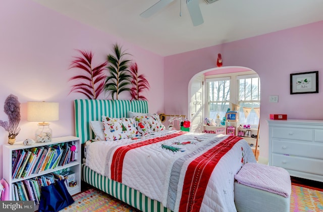 bedroom featuring hardwood / wood-style flooring and ceiling fan