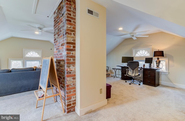 office area featuring ceiling fan, light colored carpet, and vaulted ceiling