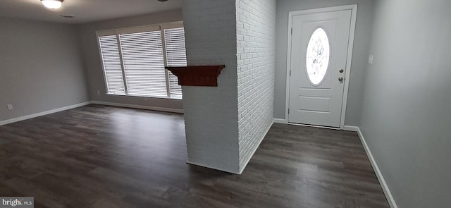 foyer entrance featuring dark hardwood / wood-style flooring