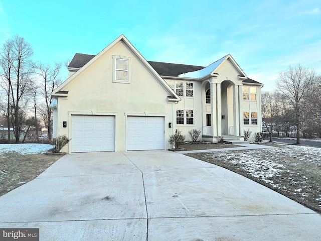 view of front of property featuring a garage