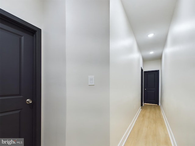 hallway featuring light hardwood / wood-style floors