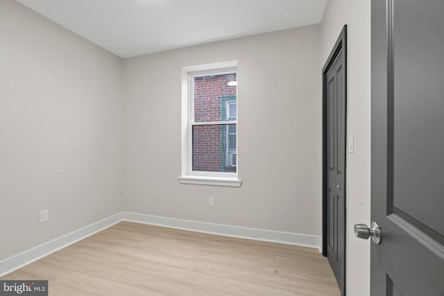 unfurnished bedroom featuring light wood-type flooring