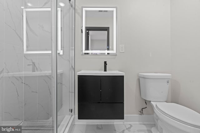 bathroom featuring walk in shower, vanity, and toilet