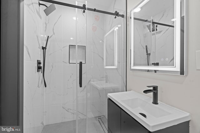 bathroom with vanity and walk in shower