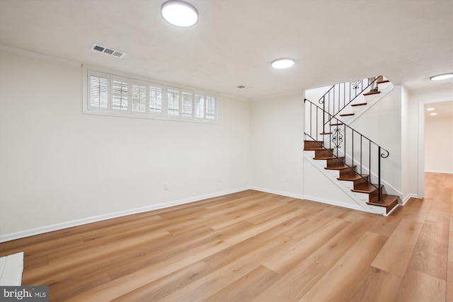 basement with wood-type flooring