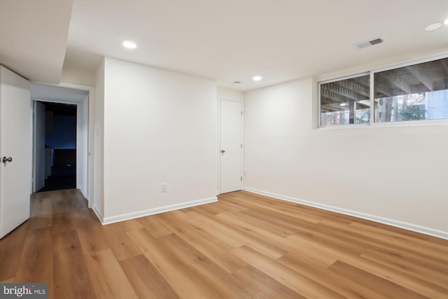 empty room featuring hardwood / wood-style floors