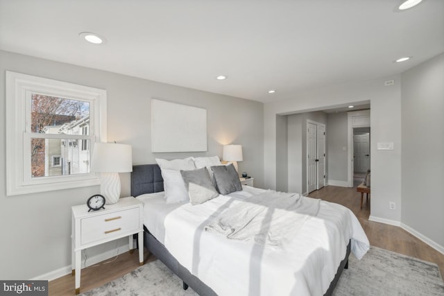 bedroom featuring hardwood / wood-style floors