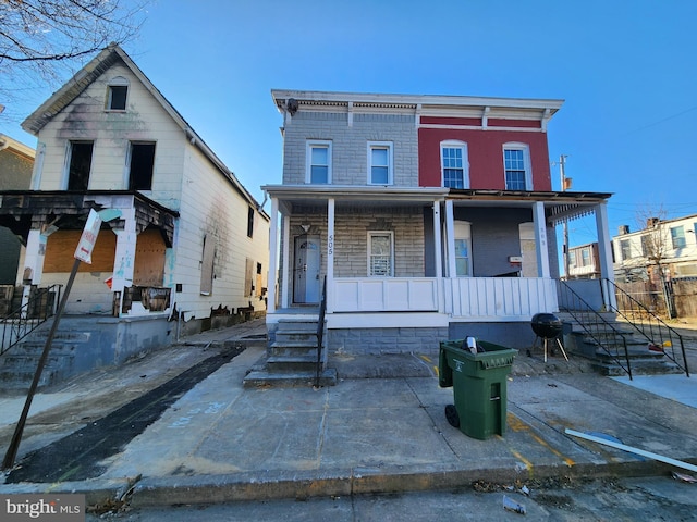 view of front of home featuring covered porch