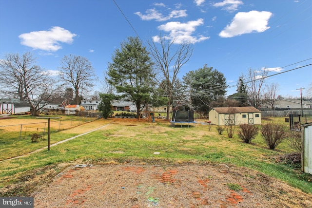 view of yard with a trampoline