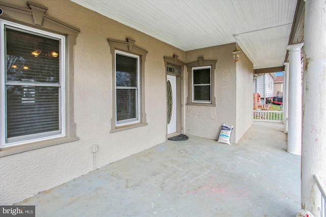 view of patio featuring a porch