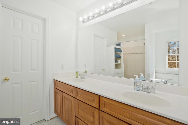 bathroom featuring vanity and tile patterned floors