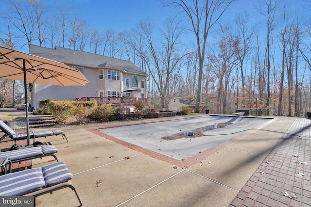 view of pool featuring a patio area