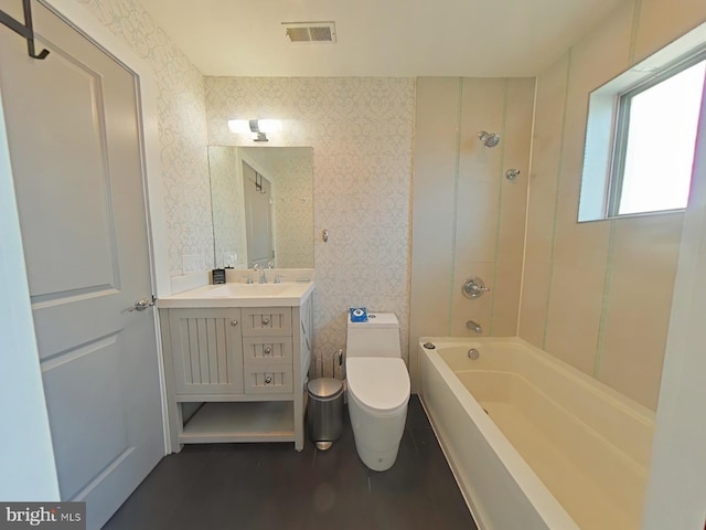 full bathroom with vanity, toilet, and shower / tub combination