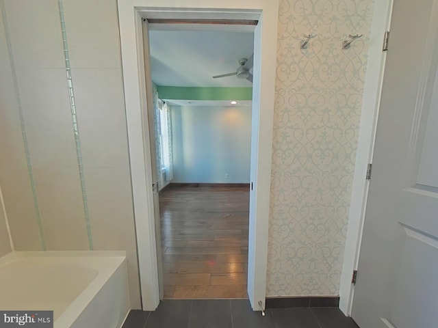 hallway with dark hardwood / wood-style floors