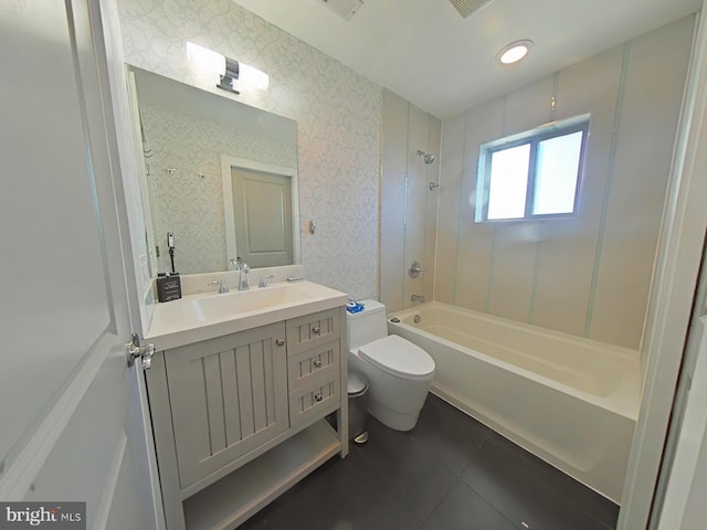 full bathroom with bathing tub / shower combination, tile patterned flooring, vanity, and toilet