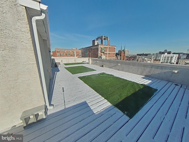 wooden deck with a yard