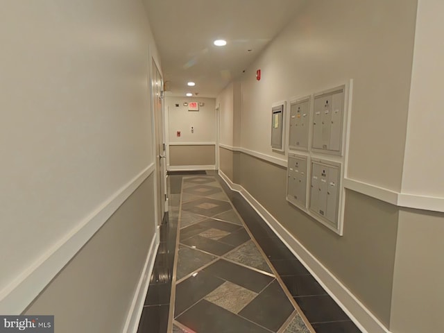 corridor featuring mail boxes