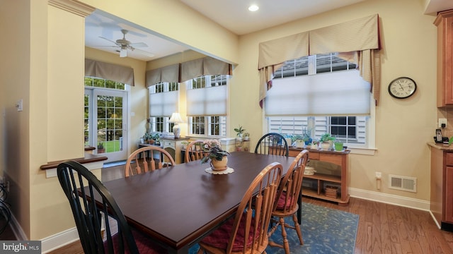 dining space featuring hardwood / wood-style floors and ceiling fan