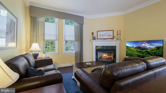 living room featuring crown molding, a high end fireplace, and dark hardwood / wood-style floors