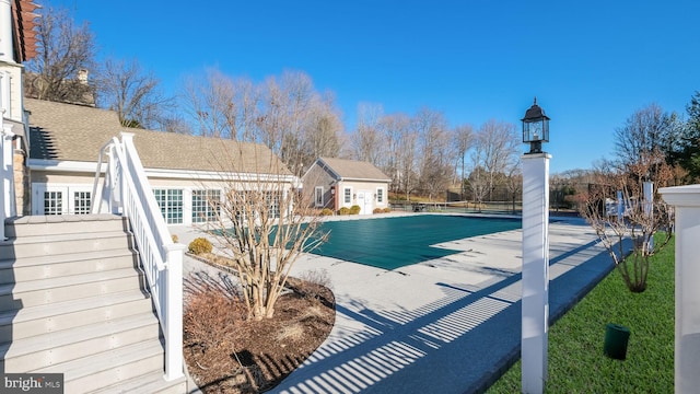 view of pool featuring a patio area