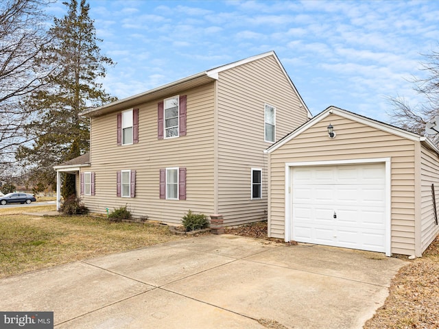 view of home's exterior featuring a garage and a lawn