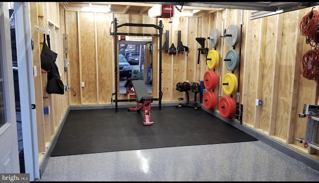 workout area with wood walls