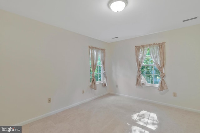 view of carpeted spare room