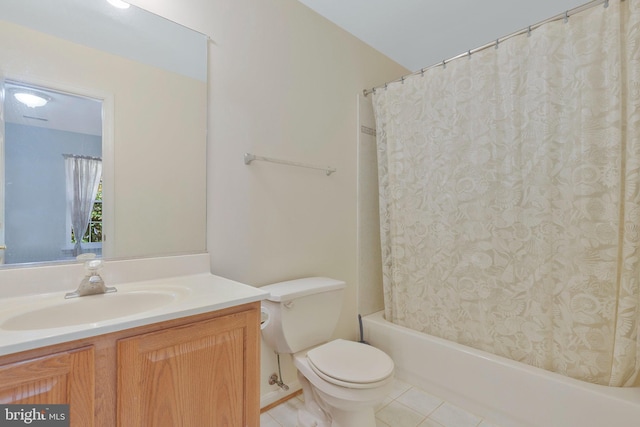 full bathroom featuring tile patterned flooring, vanity, shower / tub combo, and toilet