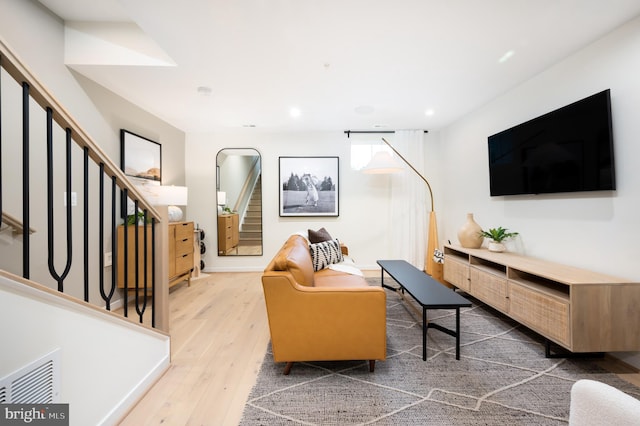 living room with hardwood / wood-style floors