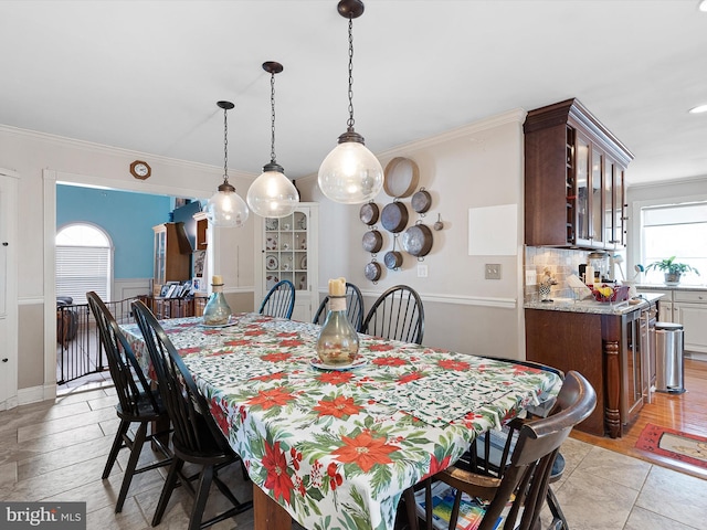 dining room with ornamental molding