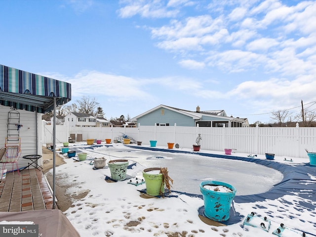 view of yard covered in snow