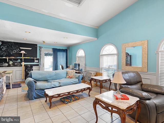 living room featuring lofted ceiling, light tile patterned floors, a wealth of natural light, and ornamental molding