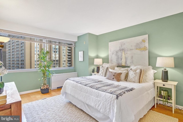 bedroom featuring light hardwood / wood-style floors