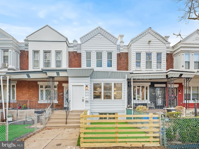 multi unit property featuring covered porch